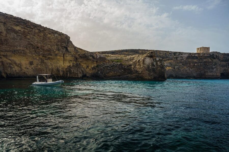 Blue Lagoon, Crystal Lagoon & Comino Caves Private Boat Tour - Santa Marija Bay slows the pace