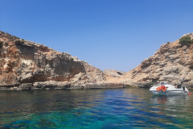 Boat Charters Blue lagoon, Crystal Lagoon, Comino, Malta 4hr trip - St. Mary’s Tower and the movie connection