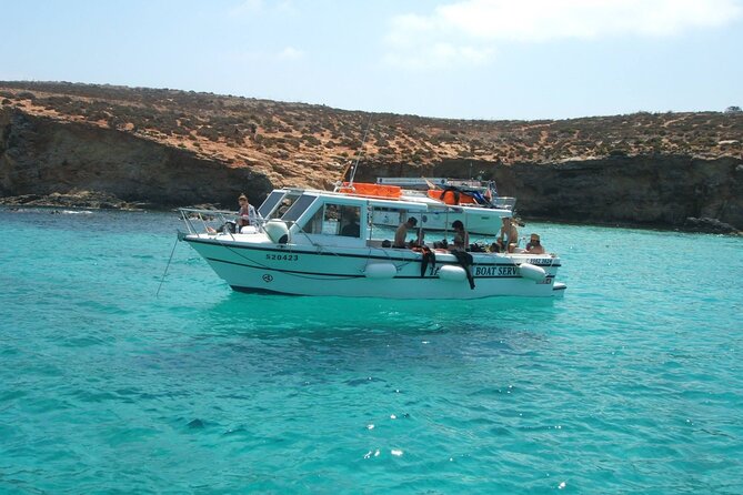 Comino and Gozo Private Boat Tour : Julie Pearl Boat - A private way to see Comino’s famous water