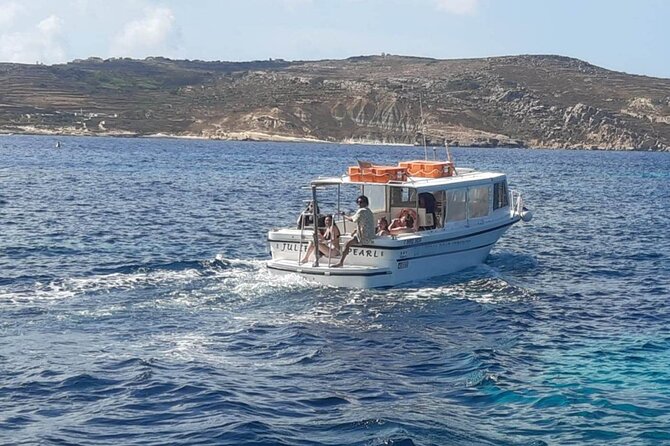Comino and Gozo Private Boat Tour : Julie Pearl Boat - Crystal Lagoon and Comino’s cave-studded coast