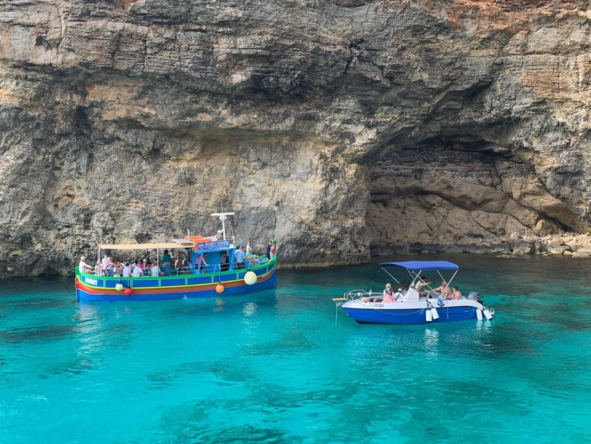 Comino: Private boat tour with Snorkeling activities & caves - The boat, shade, shower, and small comforts