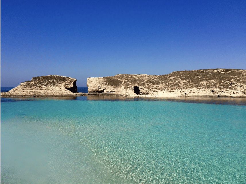 Comino's Best in a Flash: Caves, Coves & Beaches Boat Tour - Cominotto Island from the boat