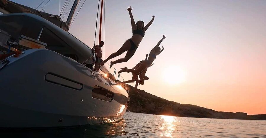 Evening Catamaran Charter - Paddleboarding and floating time