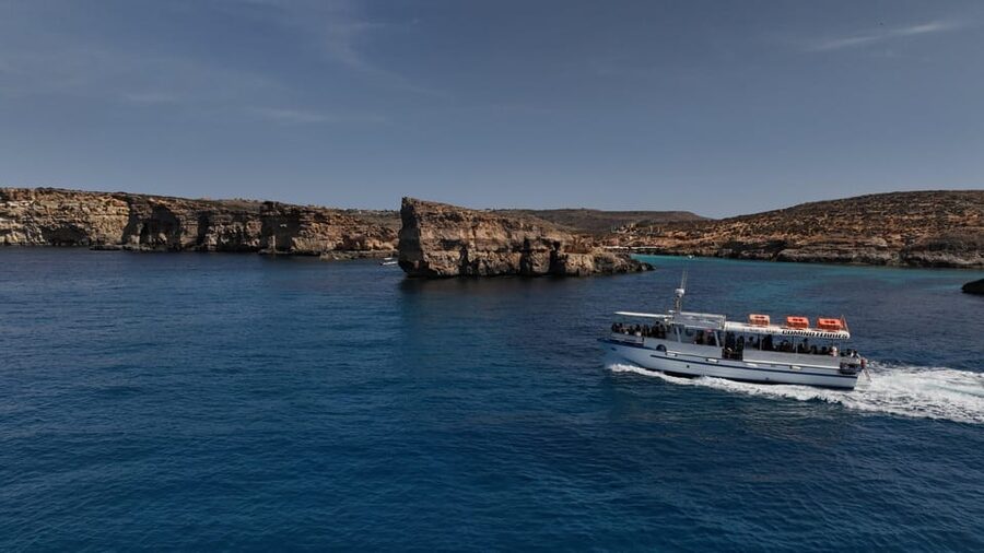 Ferry service to Blue Lagoon (opt. stop in Gozo)& Caves trip - Blue Lagoon: swimming, snorkeling, and crowds