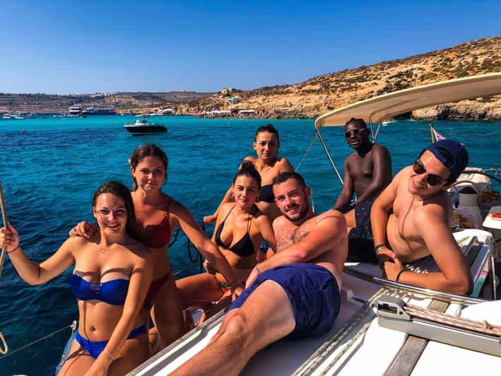From Marsamxett: Maltese Islands Private Yacht Charter - Swimming and snorkeling in Malta’s clear bays