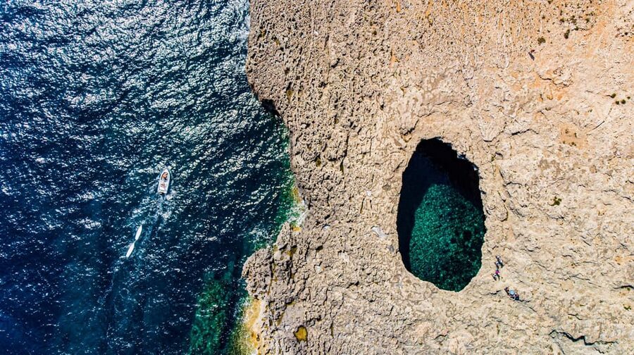From Mellieħa: Coral Lagoon Kayak Rental - Entering Coral Lagoon’s natural cave