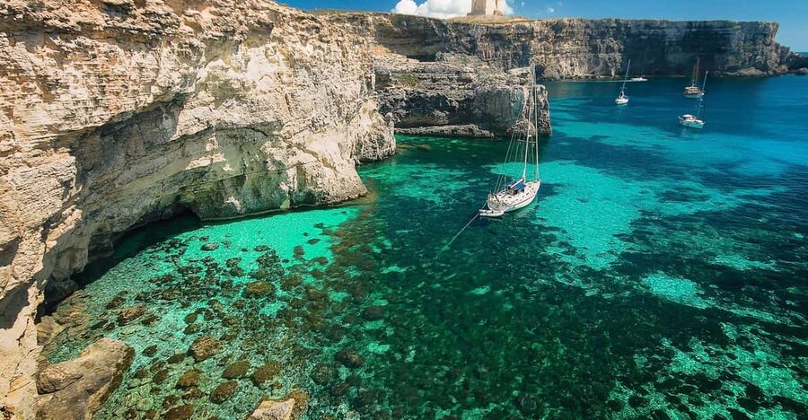 From St. Julian's: Comino and Blue Lagoon Trip by Powerboat - Finding the Jetty Behind St. George’s Bay