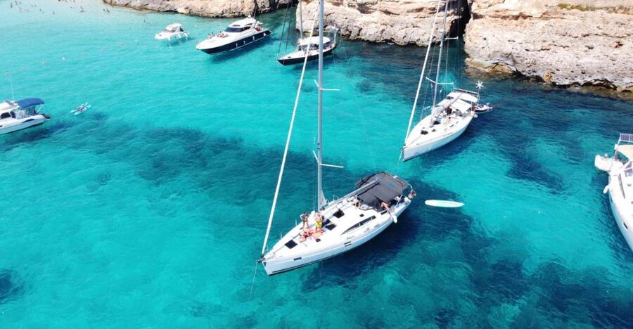 From Valletta: Full Day Private Charter on a Sailing Yacht - Blue Lagoon: the main swimming stop
