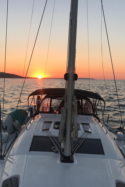 From Valletta: Romantic Sunset Cruise on a Sailing Yacht - Swimming from the yacht as daylight fades