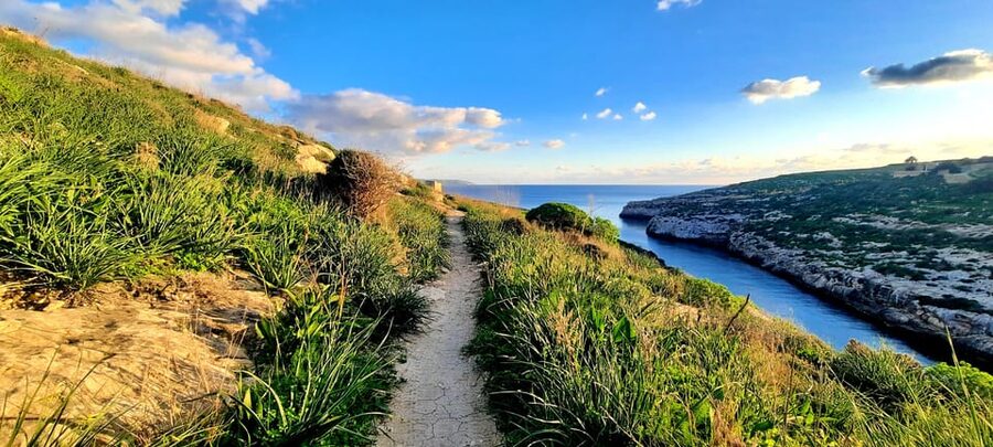 Gozo Unveiled: Guided Hiking in Gozo - South East - Mgarr ix-Xini, where stone walls frame the walk