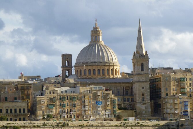 Grand Harbour Cruise - Boarding the red iSee Malta catamaran in Sliema