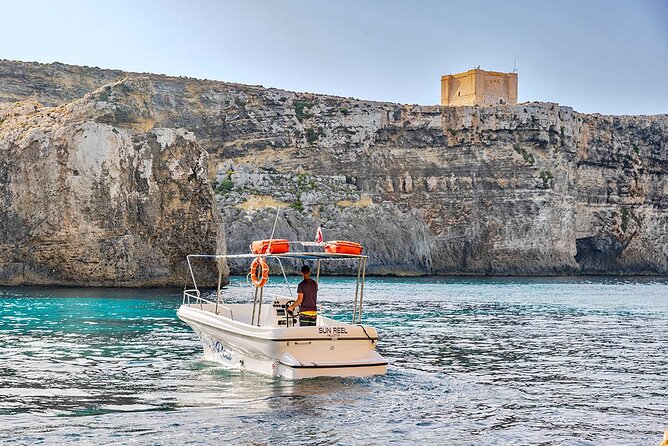 Half Day Blue Lagoon, Comino and Gozo Private Guided Boat Cruise - Halfa Rock and the final swim near Qala