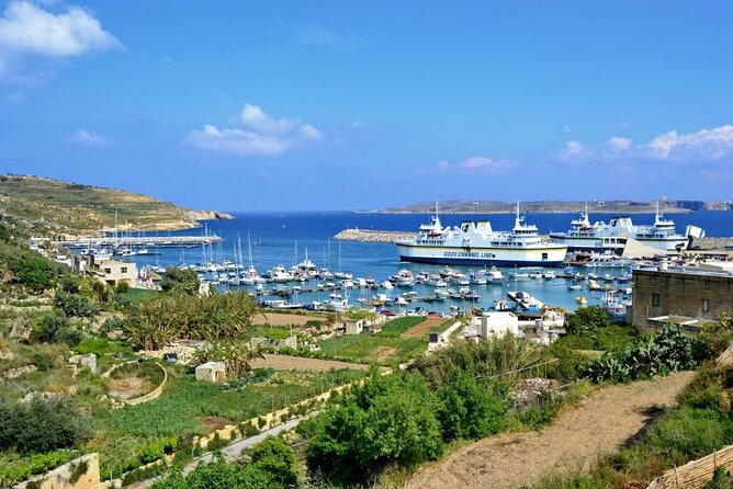 Half Day Malta Tour to Gozo Comino and Blue Lagoon Caves - Gozo Harbour and the northern Comino coast