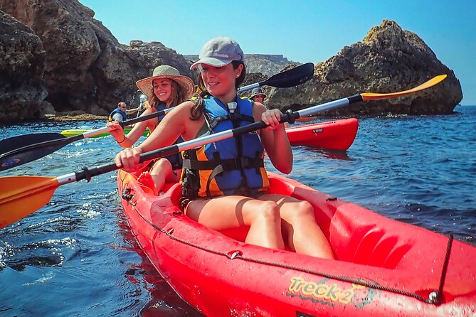 Kayak Tour Golden Hour at St Paul's Island 2 hours 30 minutes - Entering the tall cave at Tal-Mignuna Bay