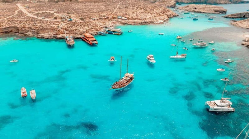 Malta: Around Comino Boat Trip with Gozo Guided Jeep Tour - The optional caves beneath Comino