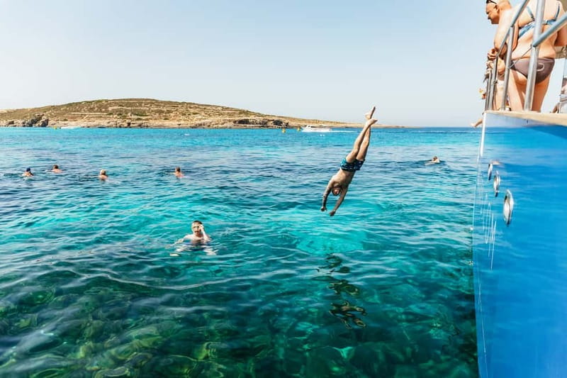 Malta: Blue Lagoon, Beaches & Bays Trip by Catamaran - Crystal Lagoon, caves, and the optional BBQ