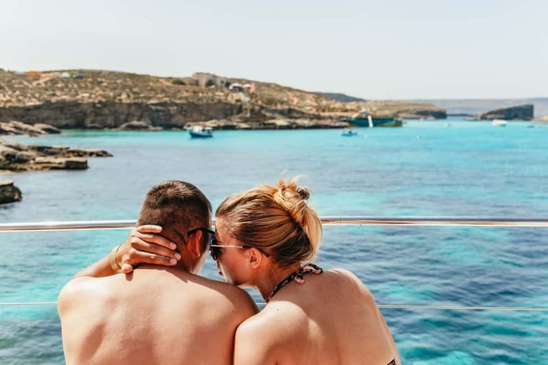 Malta: Blue Lagoon, Beaches & Bays Trip by Catamaran - Music, sun beds, and the social mood