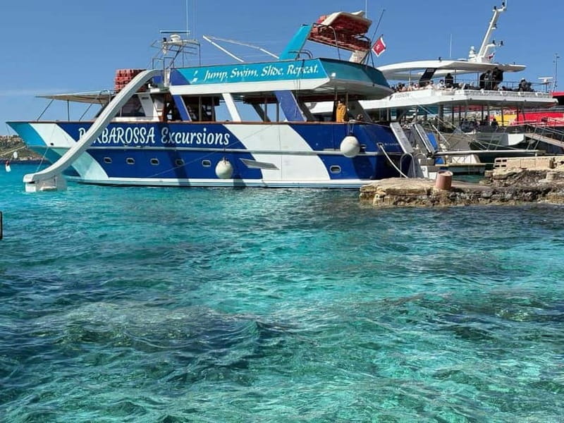 Malta: Blue Lagoon, Comino, Gozo & Crystal Lagoon Sea Caves - Boat comfort, food, drinks, and the slide