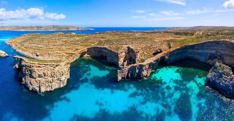 Malta: Comino+ Santa Maria Bay, Blue Lagoon + Seacaves tour - Gozo Harbour and a ten-minute photo stop