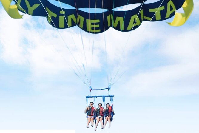 MALTA - Go & Fun Parasailing Free Photos & Videos - Rising above St Julian’s from Spinola Jetty
