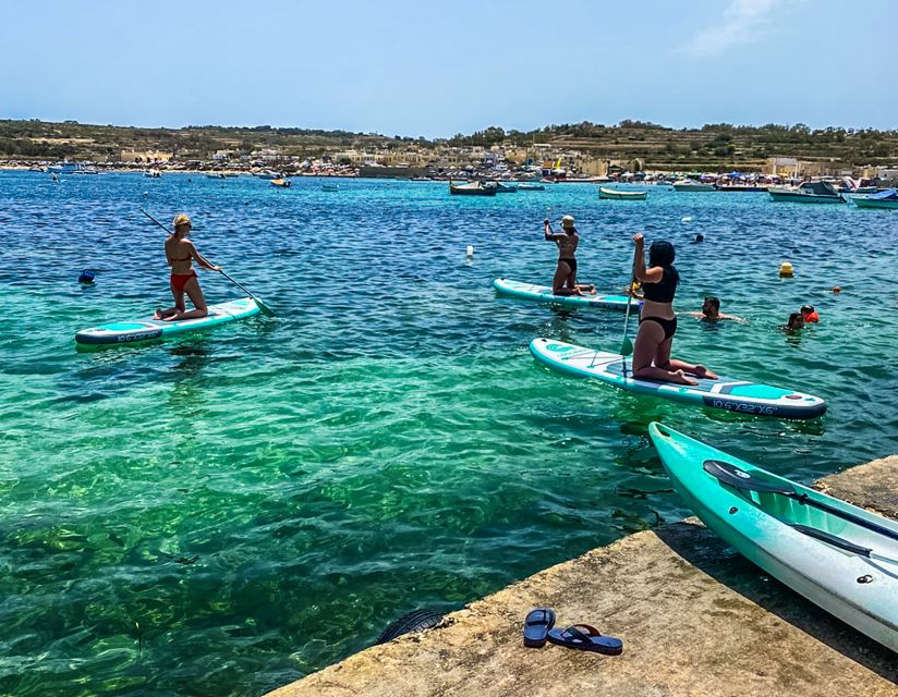 Malta: SUP Rental - Returning safely to St Thomas Bay