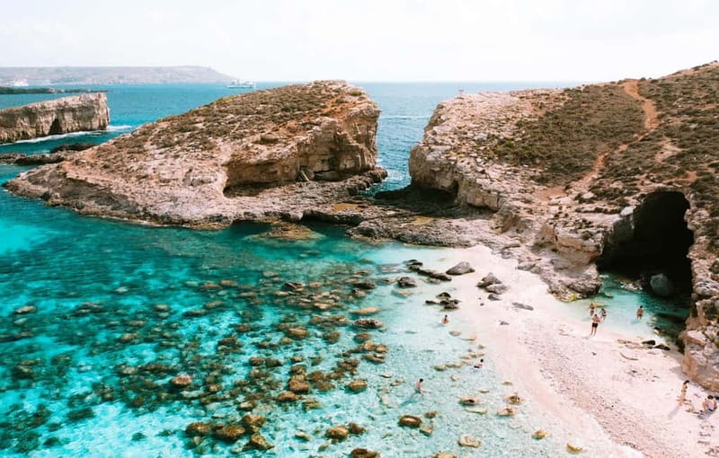 Mellieha: Round Comino, Blue Lagoon & Gozo Cruise with Water - Leaving Marfa Jetty for Comino