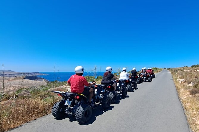 North Malta Quad Bike Tour with Land or Sea Views and Swimming - What Riding a Shared Quad Feels Like