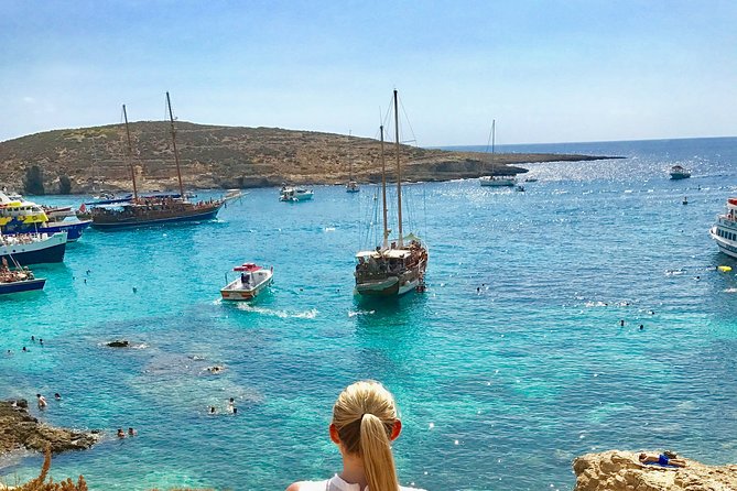 Private Boat Tour Experience with Snorkeling Blue Lagoon and Comino - Blue Lagoon: beautiful water, busy shoreline