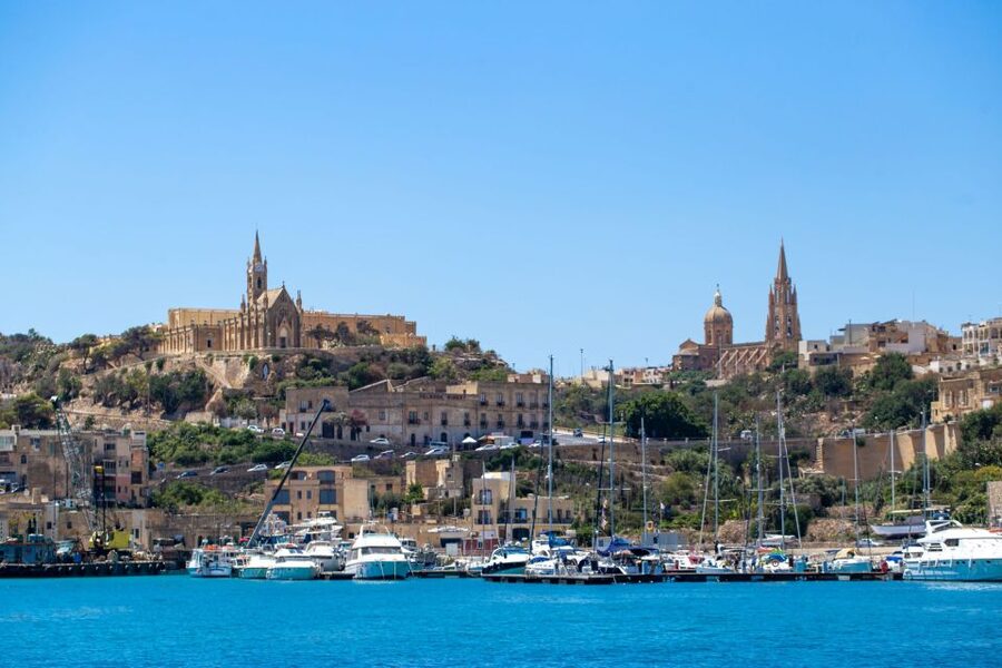 St. Paul's Bay: Gozo, Comino & St. Paul's Bus & Boat Tour - Cruising north from Bugibba